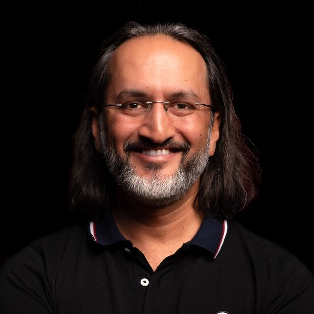 Portrait of Papa CJ, faculty at First Bridge Business School